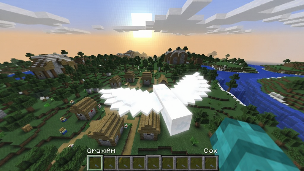 一位玩家在Minecraft世界里使用飞行超能力,从高空俯瞰一片由村庄、森林和河流组成的广阔场景,阳光透过云层洒下,画面充满梦幻色彩